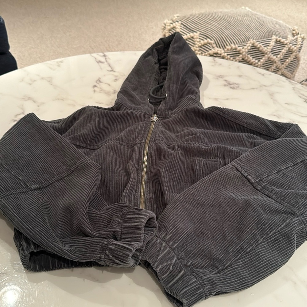 Green zip up jacket